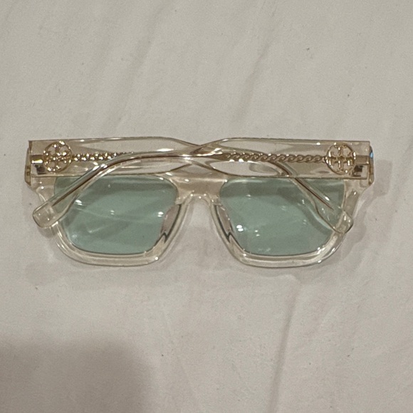 Tory Burch Clear Frame Sunglasses with Light Blue Lenses and Gold Chain Temples - Picture 2 of 7